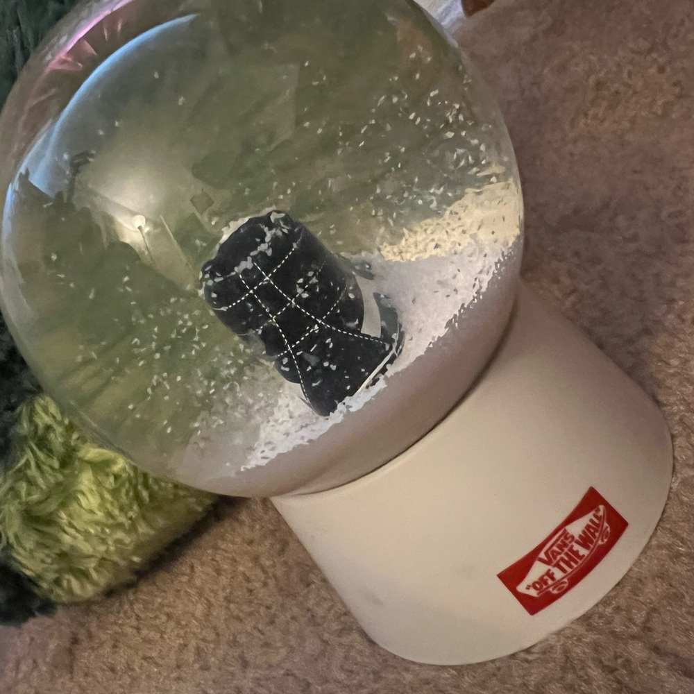 The North Face Snow Globe with Black Boot